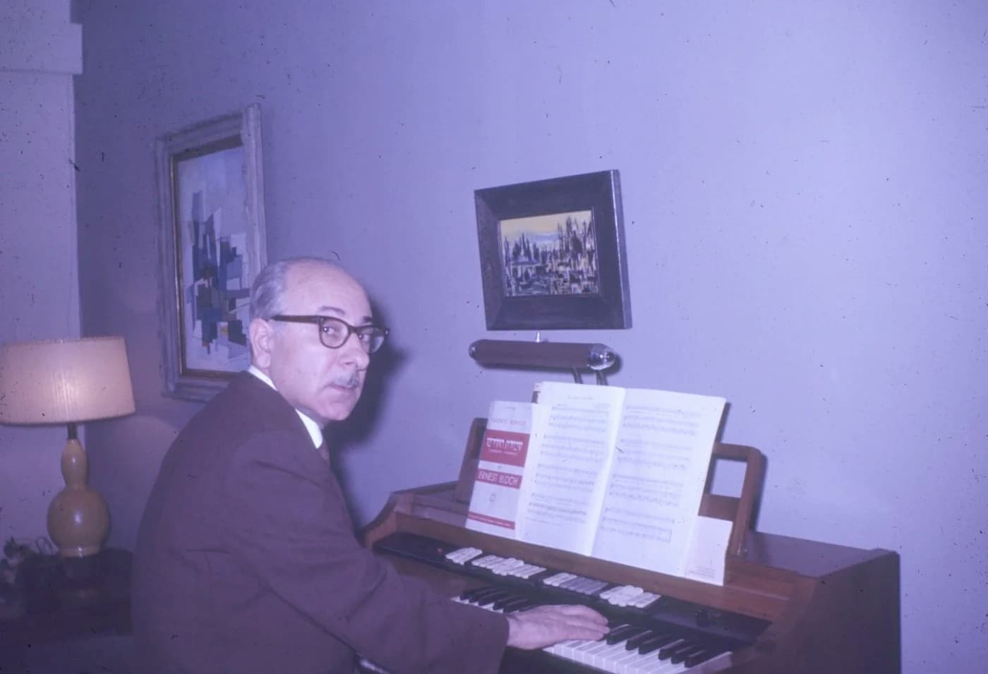 Albert sitting at an organ