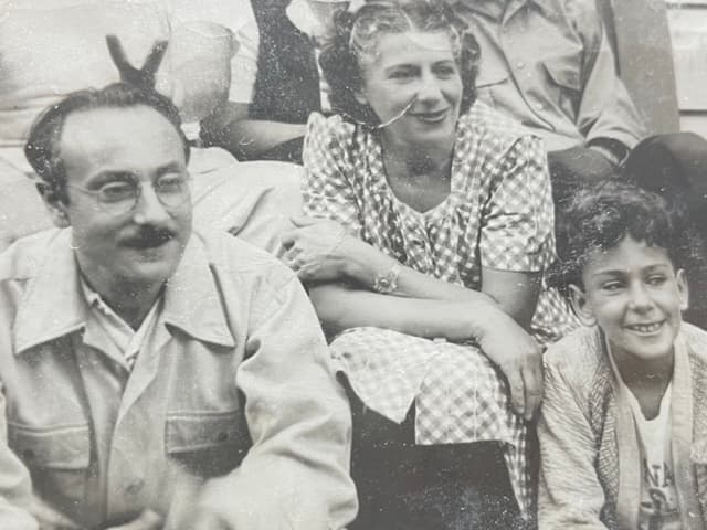 Albert with Rosanne, and their son Paul